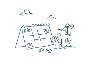 Image of people reviewing calendar.